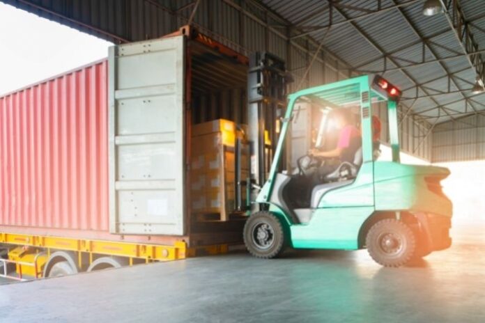 forklift being used in a warehouse as a common tool