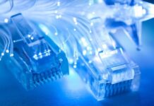 Fiber Optic Cables vs Copper Cables: Which to Choose Ethernet or copper cables lying next to fiber optic strands