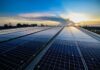 Top Benefits of Solar Panels and Sustainability solar panels sitting in front of a sunset for sustainability
