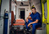 5 Important Principles All EMS Personnel Follow smiling EMS personnel sitting in medical ambulance