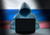 The Russian Tech Entrepreneur Fighting Putin’s Censorship Regime hacker on laptop trying to overcome Russian censorship