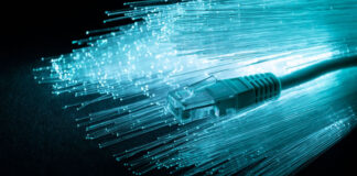 The Importance of Bandwidth in Different Networks fiber optic strands with Ethernet network cable in blue light
