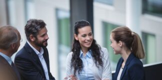 Managed Services Providers: 2022 M&A Trends for Sellers- Part 2 business people shaking hands during M&A trends for sellers