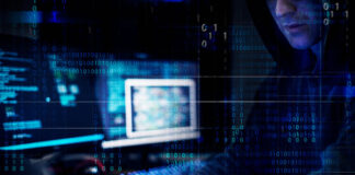 5 Ways Technology Assists Identity Theft hacker on his computer using technology for identity theft