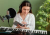 Achieving Mental Wellness Through the Power of Music girl on piano achieving mental wellness through the power of music