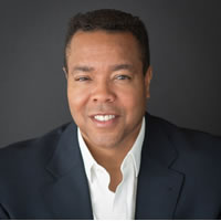Headshot of Founder and CEO Dwight Harris Jr.