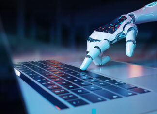 Relevancy is Key for Implementing Artificial Intelligence robotic hand on laptop implementing artificial intelligence