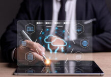 Cloud-based Invoicing Software for Business: What to Know businessman on tablet using Cloud-based Invoicing Software