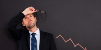 Economic Uncertainty: How does it affect M&A Transactions? businessman worried about economic uncertainty and M&A Transactions