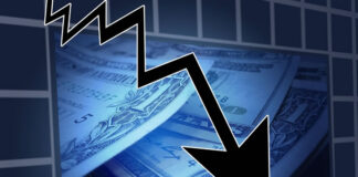 The Global Crisis is an Opportunity dollar bills with a downturn arrow representing the global crisis is an opportunity