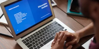 5 Benefits of Using AngularJS for App Development Person in Front of his Laptop doing app development