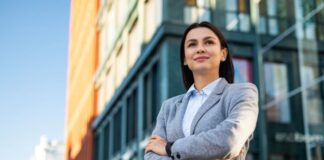 Finding and Developing Your Personal Brand: A Comprehensive Guide finding and developing your personal brand with smiling executive woman in business suit