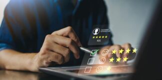 Ways to Use Data Analytics to Improve the Customer Experience man online checking the feedback boxes to improve the customer experience