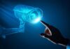 The Future of Security: Using AI to Enhance Monitoring and Recognition man touching virtual AI camera representing the future of security