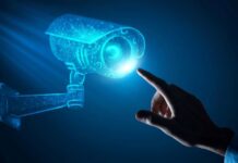 The Future of Security: Using AI to Enhance Monitoring and Recognition man touching virtual AI camera representing the future of security