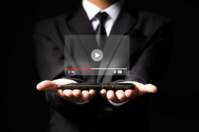 video streaming is rising to the top with man holding a tablet streaming a video
