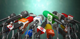 Become an Industry Expert Contributing to Top-Tier Publications become an industry expert with many microphones on a podium