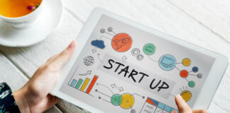 Going from Zero to One and The Art of Bootstrapping Your Startup entrepreneur on tablet while bootstrapping your startup