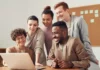 What Is Sales Enablement And Its Five Amazing Benefits? sales team smiling