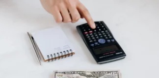 Mastering Fees: Solutions for Efficient Financial Planning Crop unrecognizable accountant using calculator near pile of American dollars