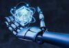 The AI and IoT Revolution: Unlocking the Power of Technology robot hand holding the future of AI and IoT