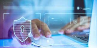 Data Privacy Concerns Prompt Marketers to Change Strategies man on laptop with digital lock image representing data privacy concerns