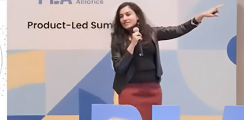 Surbhi Gupta speaking at a product event