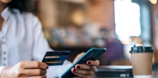 The Ever-Expanding Horizon of Ecommerce: A Trillion-Dollar Evolution woman shopping on her phone on the ever-expanding horizon of ecommerce