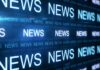 How Earned Media Can Help Build Your Brand earned media shown on a display with the word "news"