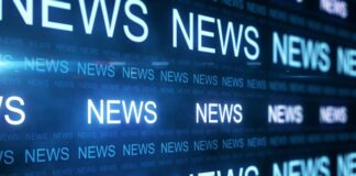 How Earned Media Can Help Build Your Brand earned media shown on a display with the word "news"