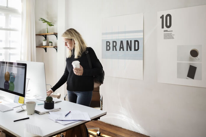 woman in office building her successful personal branding campaign