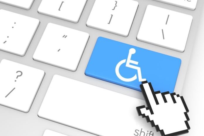 a mouse pointer over an accessibility button on a keyboard displaying the destructive impact of inaccessibility.