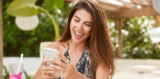 The Power of Authenticity: Establishing Your Personal Brand establishing your personal brand with smiling girl on smart phone