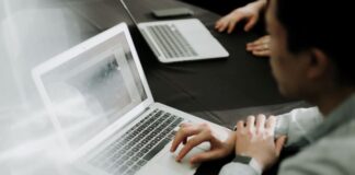 Mastering Data Interpretation: How To Analyze & Interpret Area Charts team working on laptop to determine data interpretation with charts.