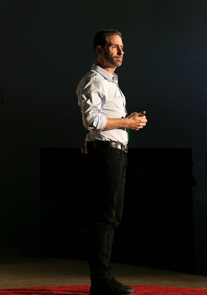 side view of Ken Sterling giving Ted Talk