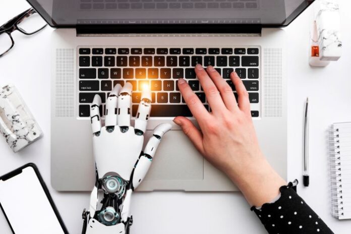 human hand and robot hand on laptop using prompt engineering for search success