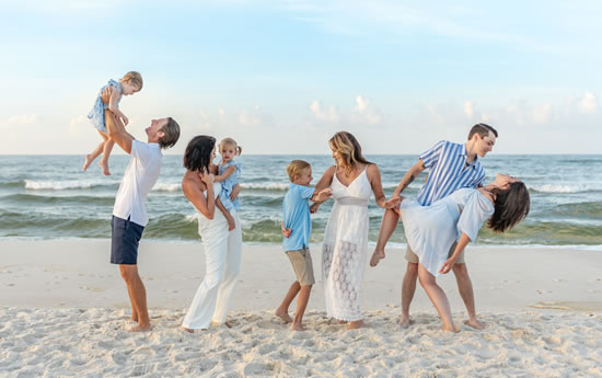 Cynthia Bentzen-Mercer dancing with family on beach
