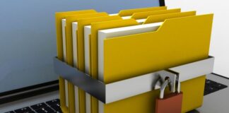 What Are the Things to Know About File Encryption? file encryption represented with file folders locked on a laptop