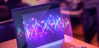 How To Create a Trading Platform | Detailed Instruction young man on a laptop using a trading platform