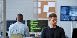 Harnessing Back-End Expertise for Technology Consulting Success two male developers with back-end expertise