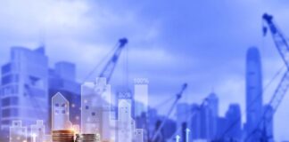 Understanding Equipment Financing and How it Works photo of city construction equipment with equipment financing coins in the forefront