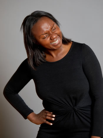 headshot of Fisayo Oluwadiya laughing