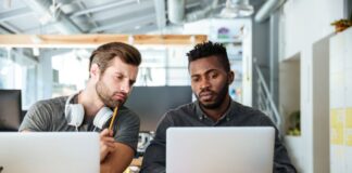 Future of Tech Innovation: Embracing Mentorship in Software Development two developers helping each other with mentorship