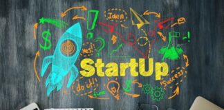 Tech Startups Thrive with Strategic Finance Leases a desk with a drawing of tech startups in chalk on it