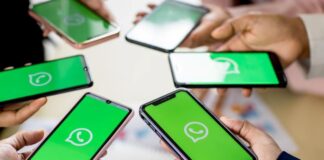 The Best 10 WhatsApp Monitoring Apps for Android & iPhone people all holding their smart phones and looking at their monitoring apps