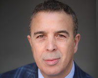 Akli Adjaoute Podcast Transcript Headshot of Founder Akli Adjaoute