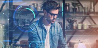 Why Small Businesses Should Embrace Managed IT Services young man working on his laptop with managed IT services