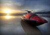 Steering Towards Success: Running a Jet Ski Rental Company red jet ski on a beach in the sunset at a jet ski rental