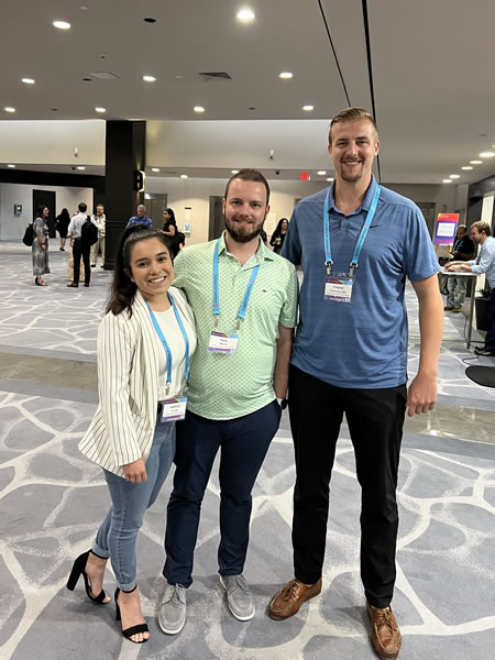 Paul Wnek with coworkers at a conference