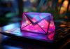 7 Key Benefits of Professional Email Hosting for Small Businesses 3D lit up email object sitting on laptop representing email hosting